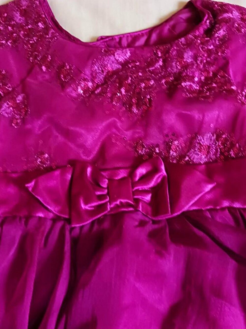 Magenta dress with bow and sequins